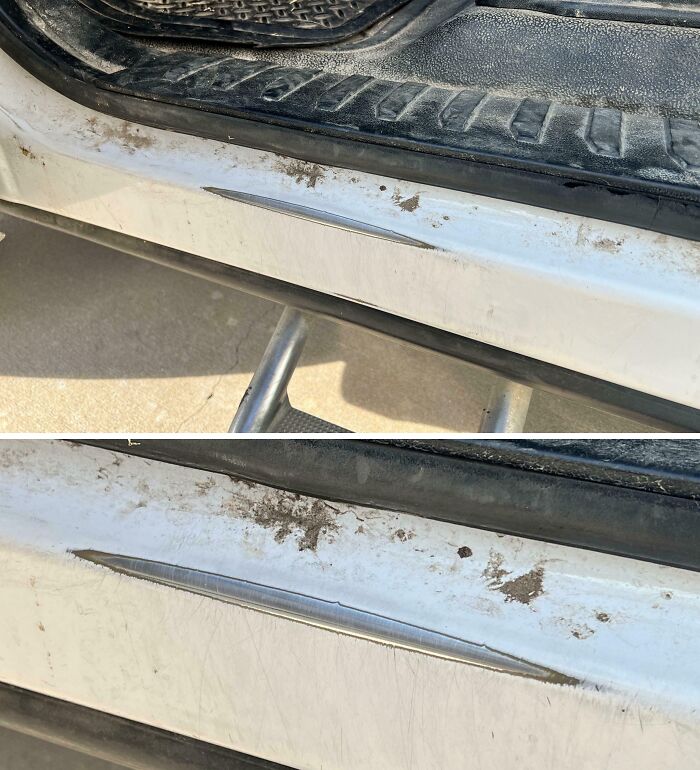 Close-up of a worn-down car door sill showing scratches and dirt on the white paint and rubber trim.