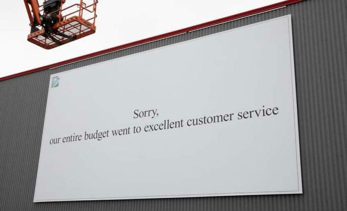 Print advertisement on a billboard using humor and creativity to highlight excellent customer service and stand out from competitors.