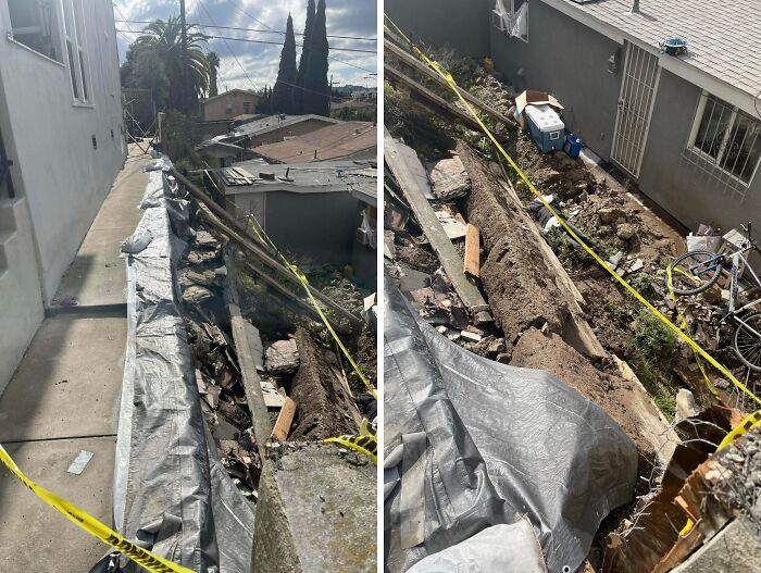Construction fail with collapsed wall and damaged property along a narrow pathway, showing expensive and unfortunate fails.