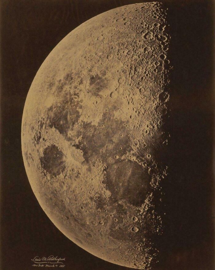 Victorian era photograph of the moon showing detailed craters and surface texture from an 1865 telescope image.