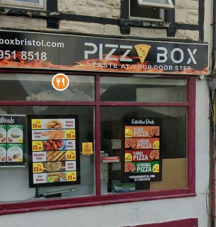 Pizza restaurant storefront with menu boards displaying various pizza deals and prices, showcasing design and writing fails.