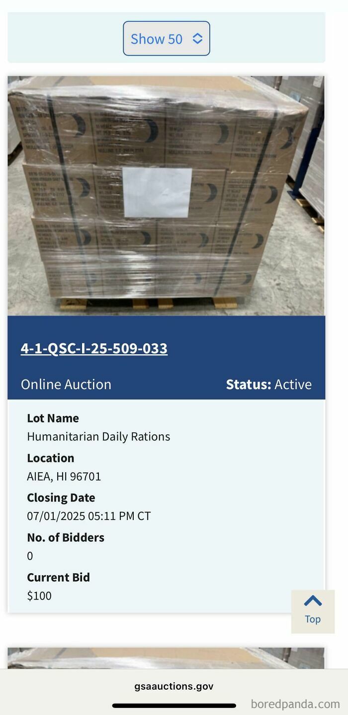 Pallet of humanitarian daily rations wrapped in plastic at online auction reflecting U.S. warning signs.