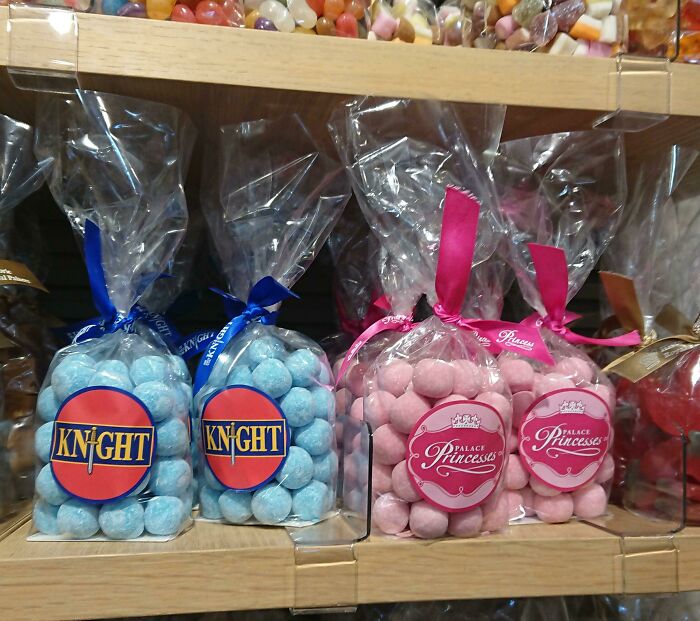 Bags of blue Knight and pink Princess candies side by side, illustrating examples of gendered nonsense packaging.