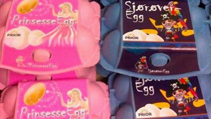Pink and blue egg cartons labeled princess and pirate eggs highlighting gendered nonsense packaging trends.