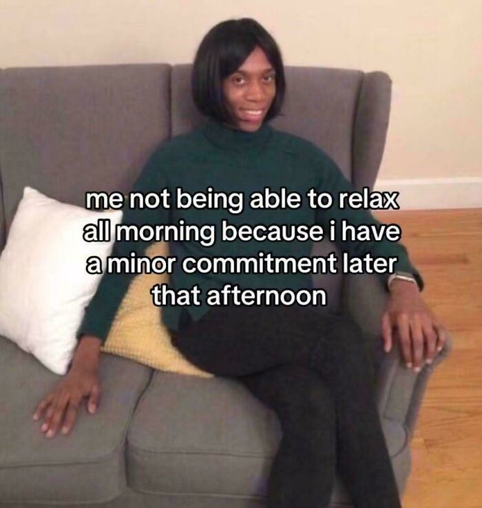 Person sitting awkwardly on a couch with a relatable meme about anxiety and minor commitments, illustrating funny relatable memes.