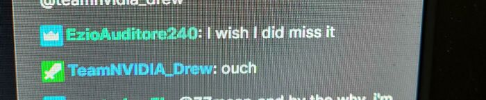 Chat screen showing social media comebacks and comments between users with highlighted usernames in a dark interface.