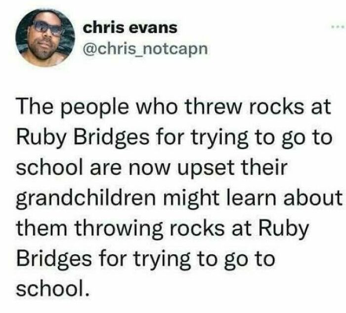Chris Evans tweet calling out the world we're living in, highlighting hypocrisy about Ruby Bridges and education issues.