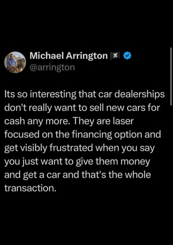 Tweet by Michael Arrington discussing frustration with car dealerships focusing on financing over straight cash sales in the world we're living in.