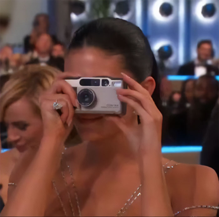 Celebrity at Golden Globes using a camera, highlighting after Timothée Chalamet snubs Kylie Jenner event moments. Celebrity at Golden Globes using a camera, highlighting after Timothée Chalamet snubs Kylie Jenner event moments.