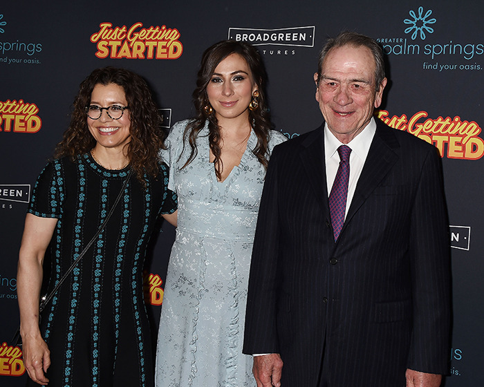 Three people posing at an event discussing the new theory after 911 call reveals code word in Victoria Jones’ final moments.