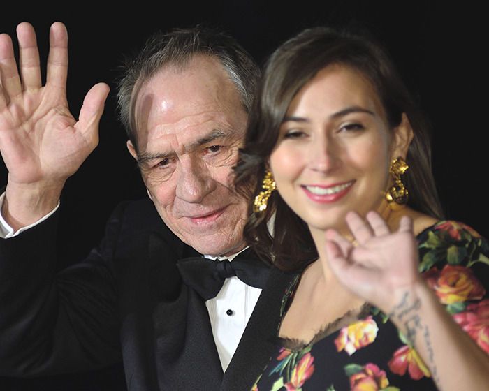 Man and woman waving at event, representing new theory about 911 call code word in Victoria Jones final moments.