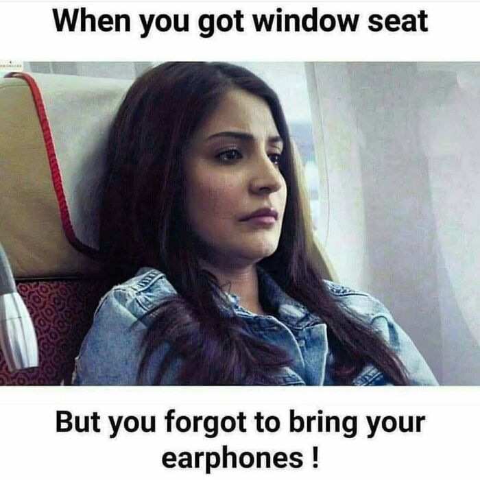 Woman looking disappointed sitting by an airplane window seat, travel memes about forgetfulness on trips.