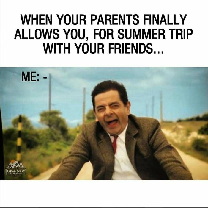 Man excitedly riding a bike outdoors representing hilarious travel memes about summer trips with friends.