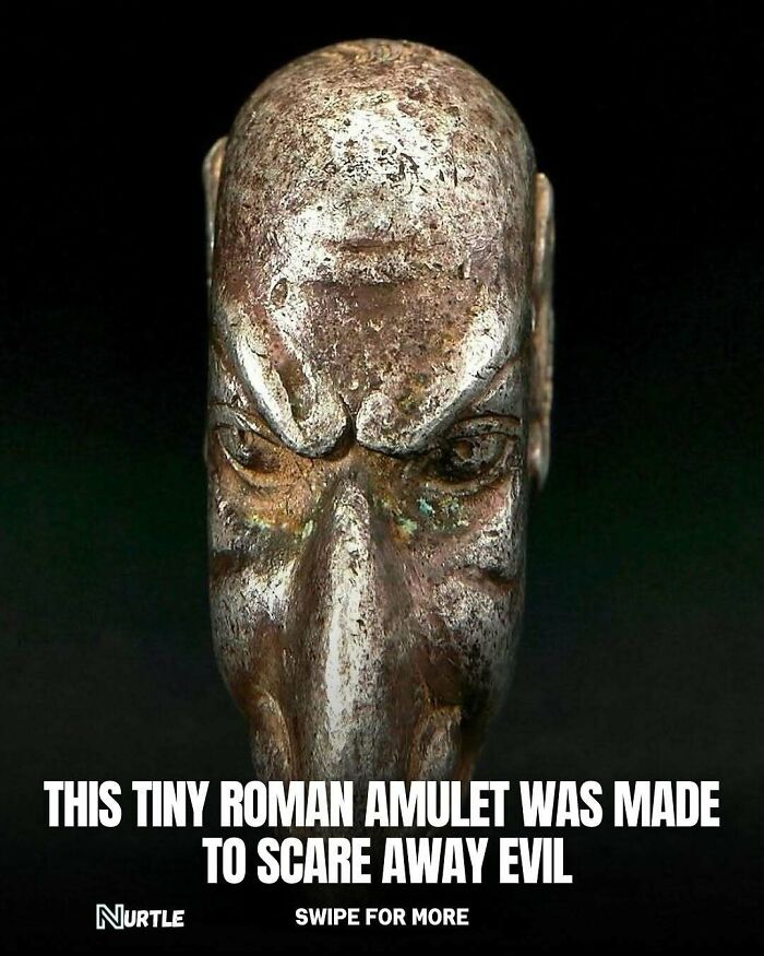 Ancient Roman amulet with a fierce face designed to scare away evil, featured in random facts collection.