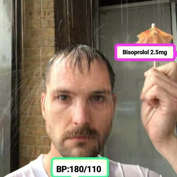 Man holding small umbrella labeled Bisoprolol 2.5mg with water spraying, illustrating humor about expensive healthcare and medication costs.
