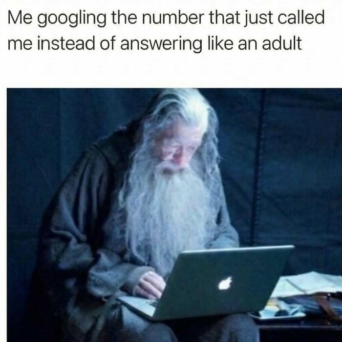 Elderly man with long white beard using a laptop, illustrating a funny meme about avoiding calls and googling numbers.