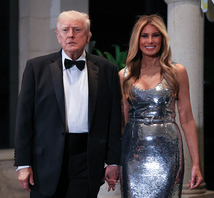 Melania Trump and Donald Trump dressed formally at Mar-a-Lago event with Melania’s body language drawing attention. Melania Trump and Donald Trump dressed formally at Mar-a-Lago event with Melania’s body language drawing attention.