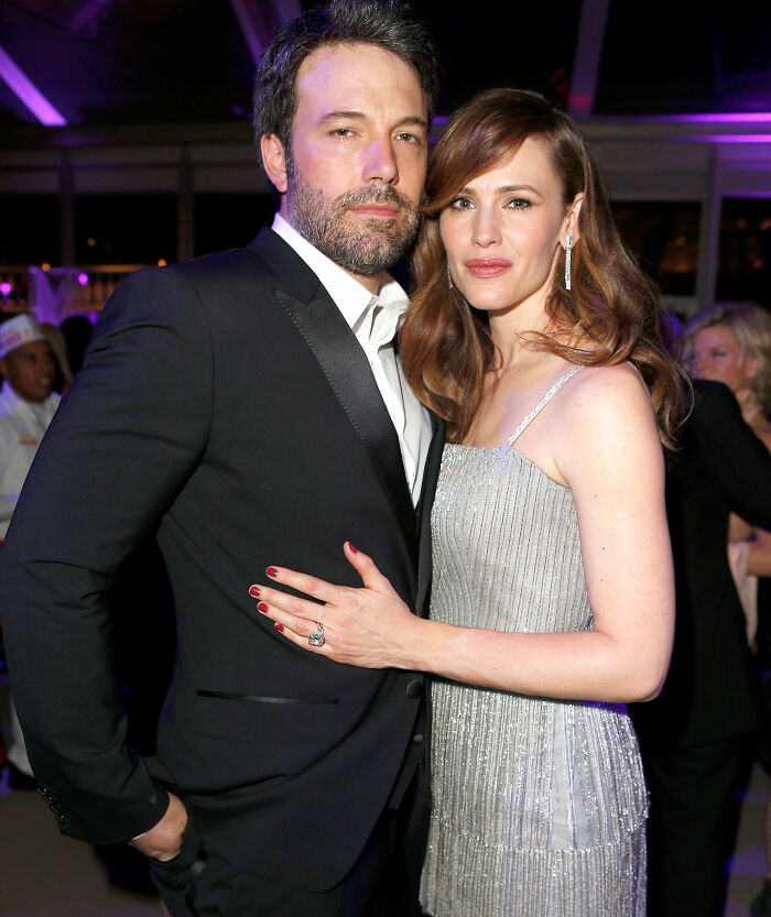 Ben Affleck and Jennifer Garner posing together at an event, highlighting her rare comments about trauma bonding. Ben Affleck and Jennifer Garner posing together at an event, highlighting her rare comments about trauma bonding.