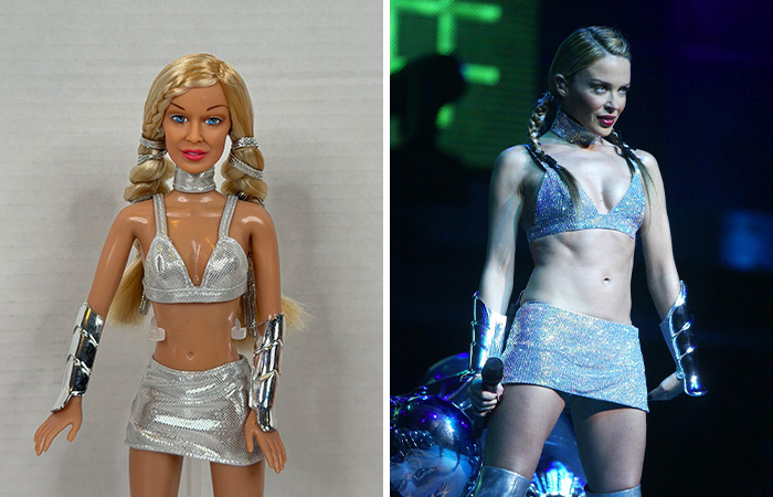 Celebrity doll in silver outfit next to a female performer wearing a matching silver costume on stage, highlighting celebrity dolls.