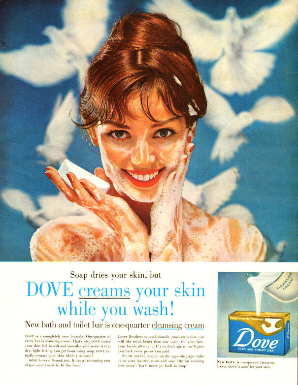 Vintage Dove ad showing skincare values with a smiling woman washing her face with cleansing cream.