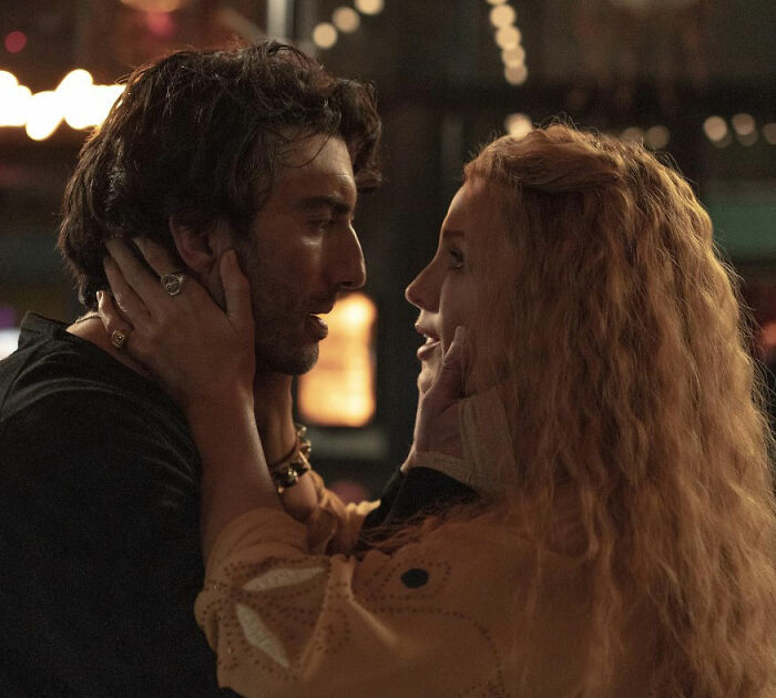 Man and woman holding each other's faces in an intimate moment, relating to Taylor Swift leaked texts and damning words. Man and woman holding each other's faces in an intimate moment, relating to Taylor Swift leaked texts and damning words.