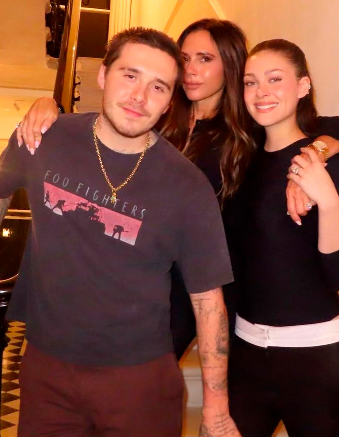 Victoria Beckham and Nicola Peltz posing together, highlighting tense exchange and viral feud attention.