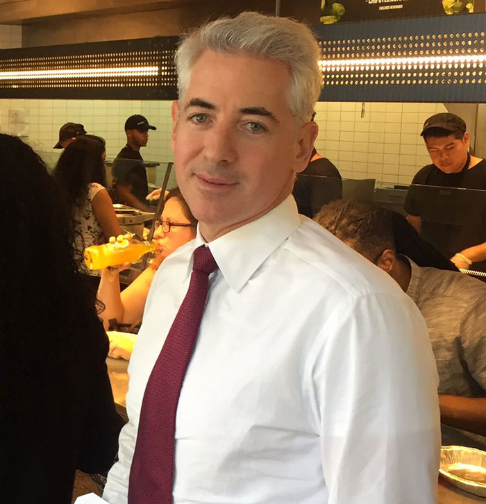Minneapolis ICE agent in white shirt and red tie in a crowded restaurant setting after crowdfunding campaign.