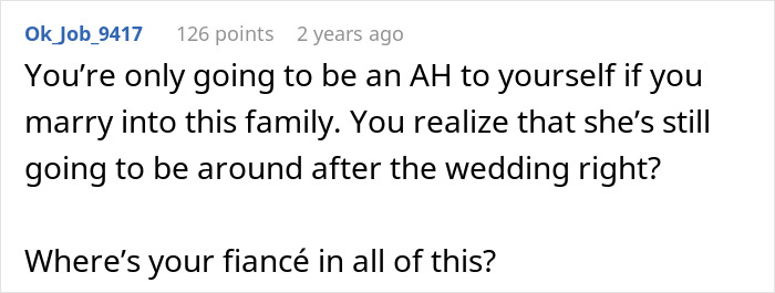 Screenshot of a Reddit comment discussing conflict with a mother-in-law over wedding venue and dress issues.