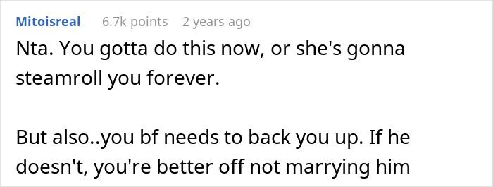 Reddit comment advising bride to confront MIL hijacking venue and dress, emphasizing backing from boyfriend for support.