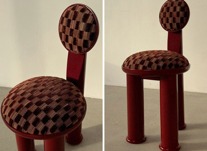 Unique modern chair with checkered upholstery and bold red legs, a cool interior design idea for stylish home decor.