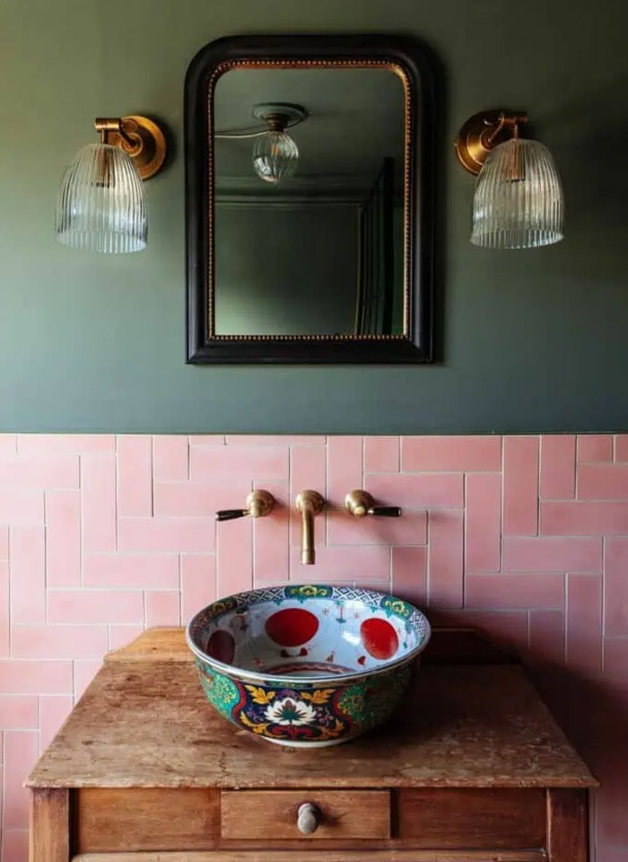 Decorative bathroom sink with colorful patterns, brass fixtures, and cool interior design ideas for a stylish home.