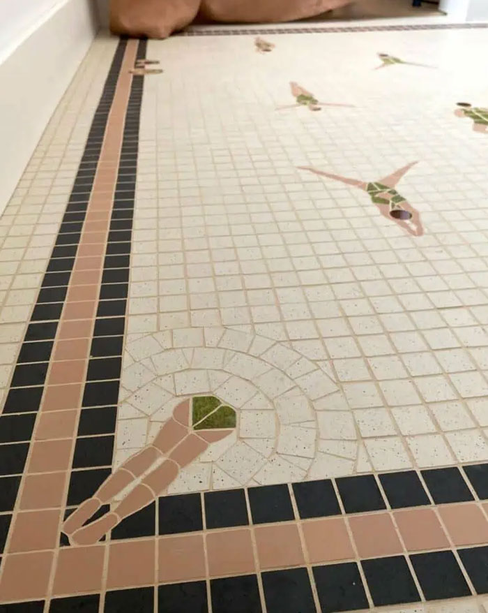 Mosaic tile floor featuring artistic swimmer designs and geometric border, showcasing cool interior design ideas.