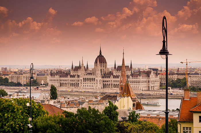 Budapest skyline at sunset with Hungarian Parliament on the Danube, travel Tokyo coolest cities