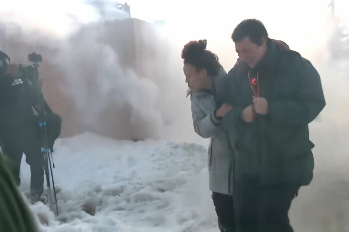 Family in distress outside building filled with smoke, highlighting tragic incident involving mom slain by ICE agent. Family in distress outside building filled with smoke, highlighting tragic incident involving mom slain by ICE agent.