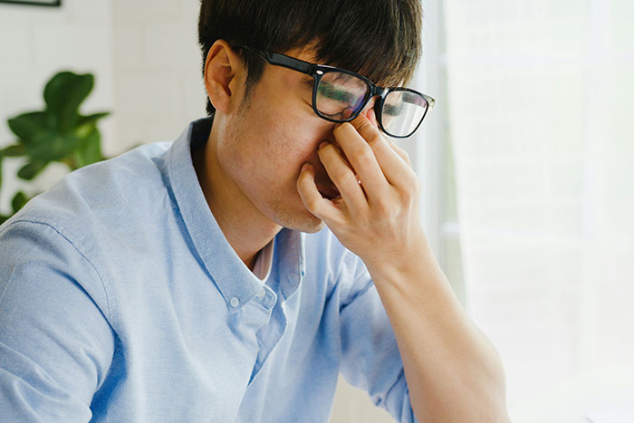 Young man in glasses showing frustration, illustrating moments when a so called expert was proven wrong.