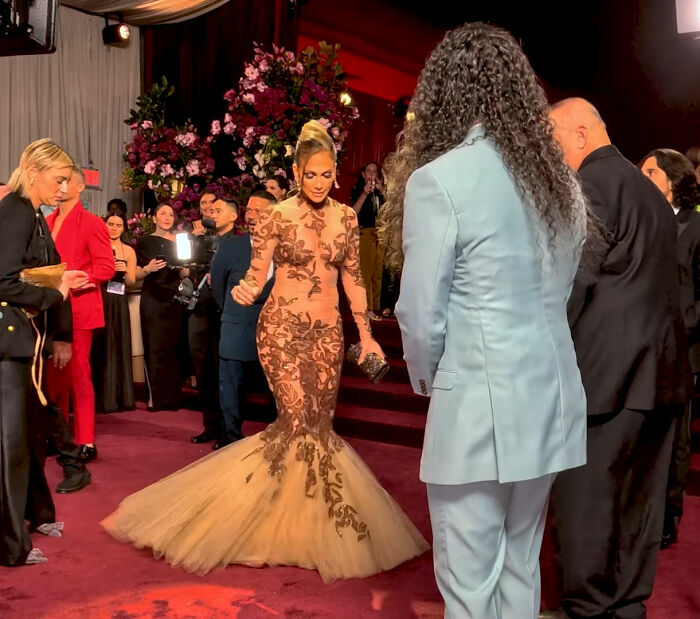 Jennifer Lopez in a detailed gown at the Golden Globes, amid an event stirring backlash over her rude interaction. Jennifer Lopez in a detailed gown at the Golden Globes, amid an event stirring backlash over her rude interaction.