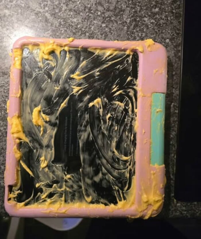 Woke up expecting a normal day - tablet in pink kid case smeared with peanut butter across the screen