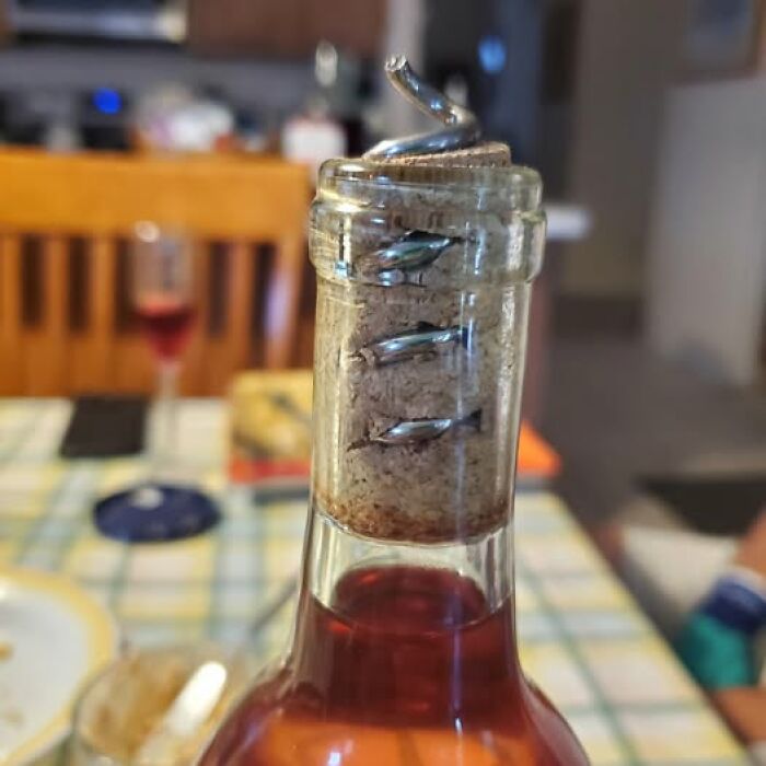 Woke up expecting wine bottle cork pierced by staples with broken corkscrew stuck on top