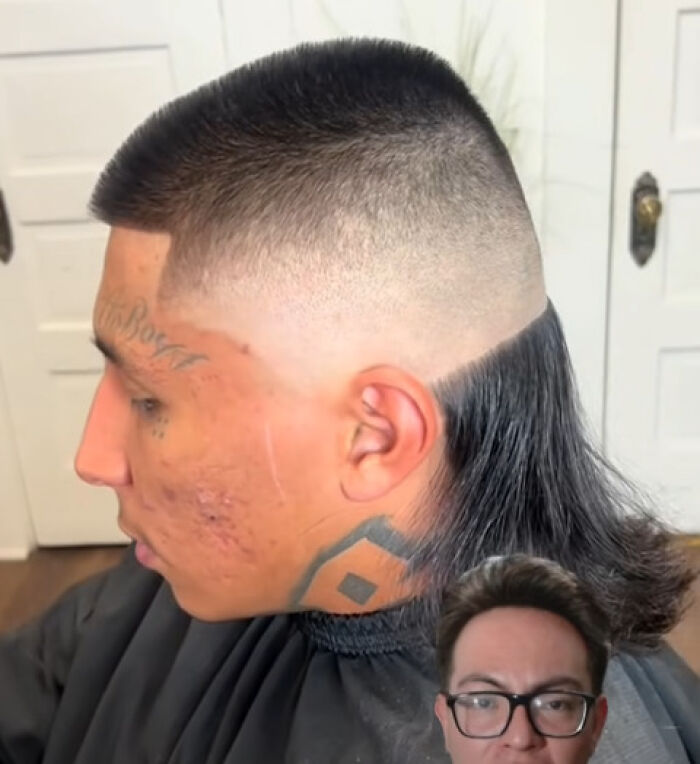 Side view of a man with a disastrous hairstyle featuring a high fade and long mullet, highlighting questionable life decisions.