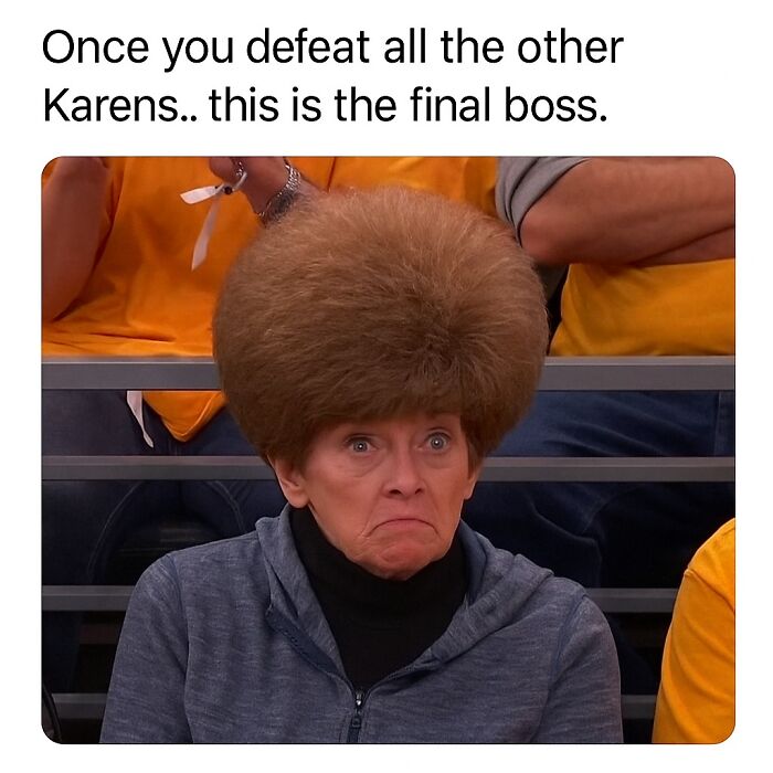 Woman with exaggerated large hair looking serious and confused in a funny meme about randomness and final boss Karen.
