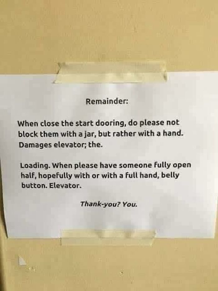 Confusing elevator sign with unclear instructions causing people to break their brain trying to understand the message.