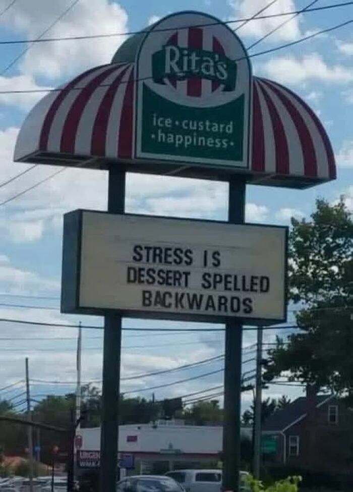 Rita's ice custard happiness sign with a confusing message about stress and dessert spelled backwards.