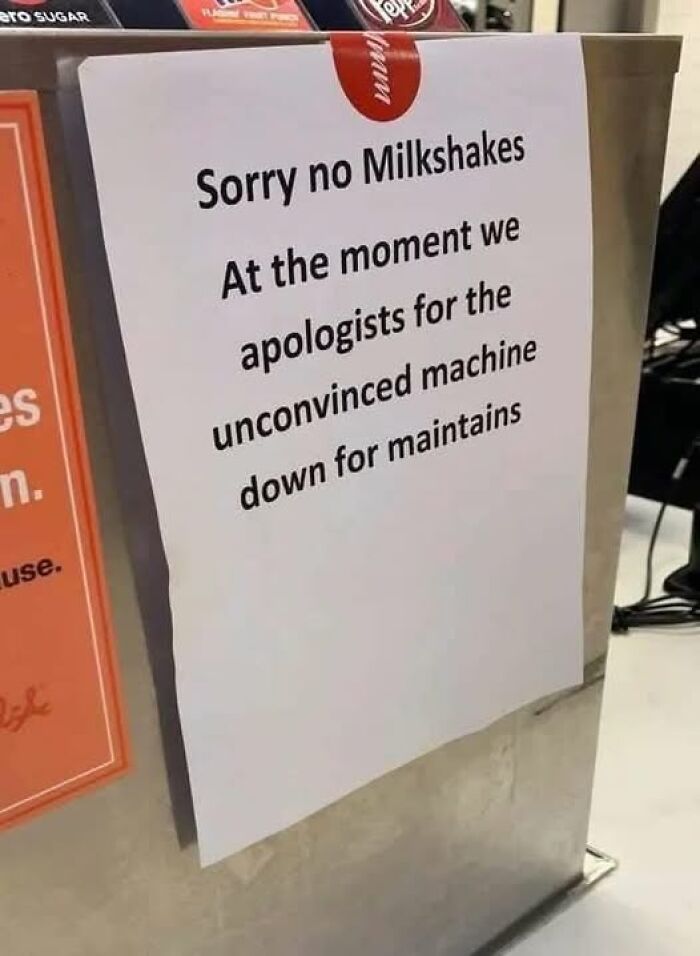 Sign with confusing grammar apologizing for no milkshakes due to a machine down, illustrating people breaking their brain.