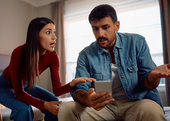 Woman and man arguing over phone evidence in a tense moment, highlighting woman’s award winning act exposed in court. Woman and man arguing over phone evidence in a tense moment, highlighting woman’s award winning act exposed in court.