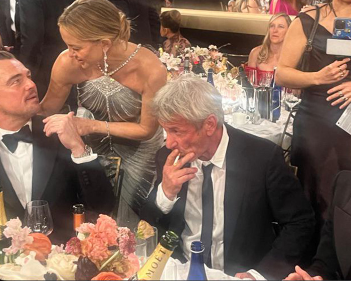Actors at 2026 Golden Globes event showing chaotic moments as some smoke at tables despite ban and others leave early.