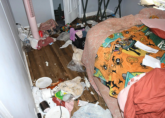 Cluttered and dirty mobile home interior showing evidence of neglect and abandonment in a horrific living situation. Cluttered and dirty mobile home interior showing evidence of neglect and abandonment in a horrific living situation.