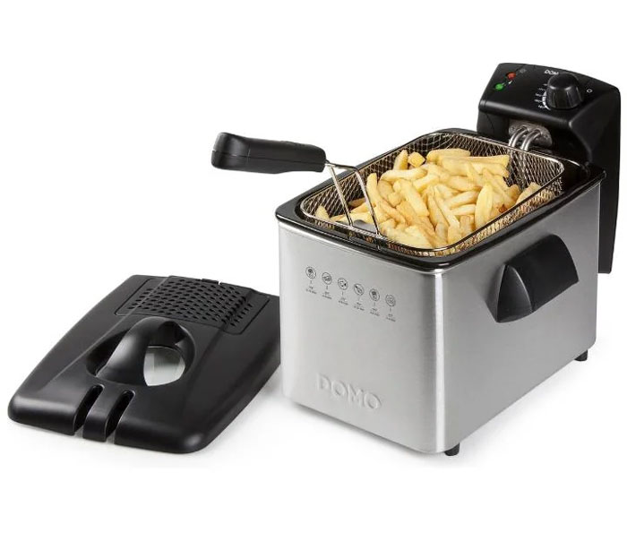 Household item deep fryer filled with French fries, showing stainless steel body and black detachable lid.