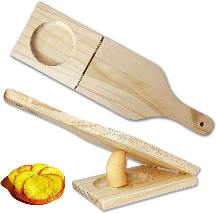 Wooden household item for cutting fruits, a traditional kitchen tool shared by 100 people from different countries.