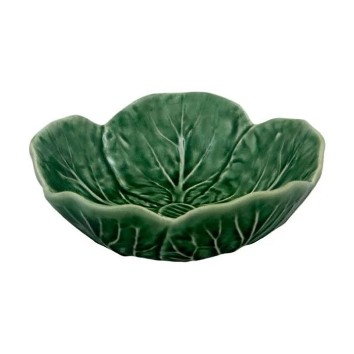 Green ceramic household item shaped like a leafy bowl, unique and rarely found outside its country of origin.