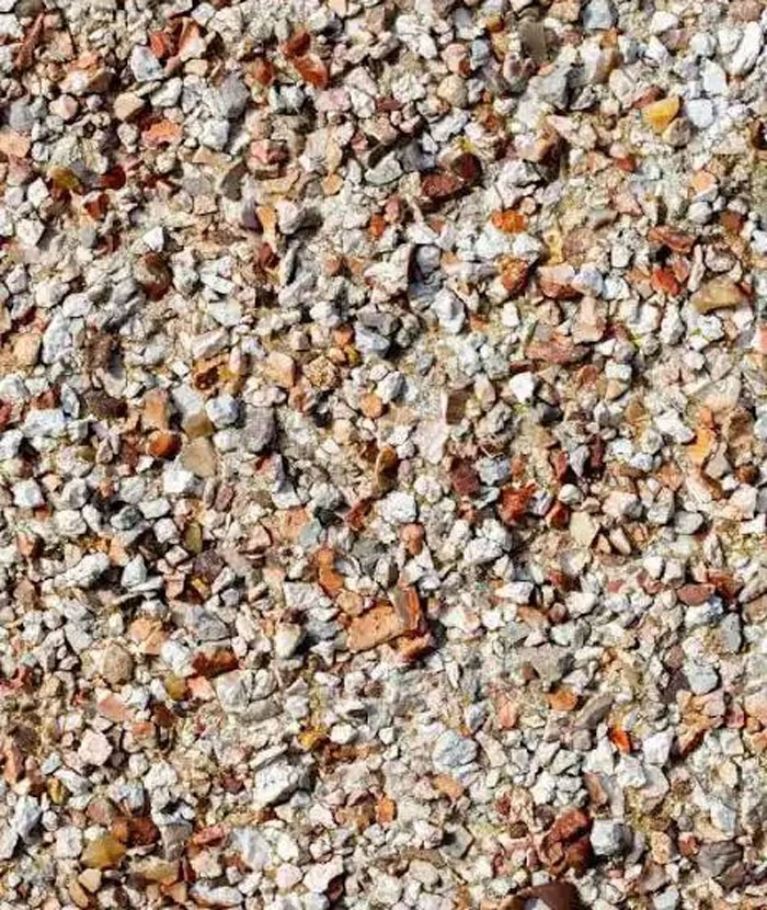 Close-up of a textured household surface featuring small, multicolored stones unique to certain countries.